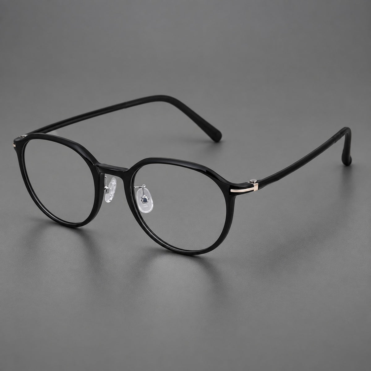 Retro round plastic eyeglasses with a curved bridge and slim metal corner accents — Glossy Black — Main view [CINILY-JD2026-2201-C6]