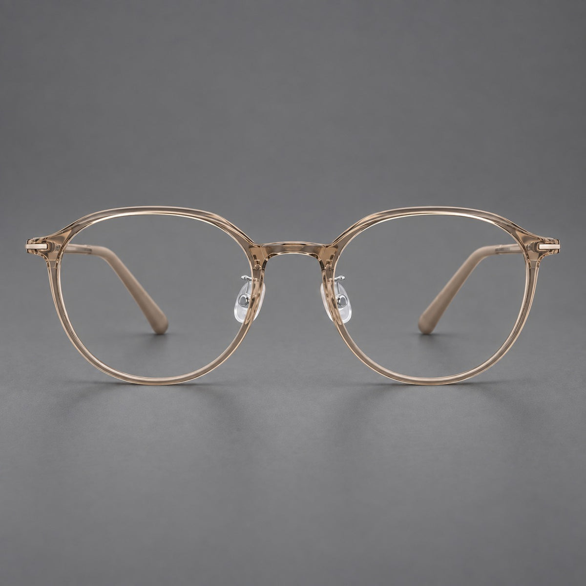 Retro round plastic eyeglasses with a curved bridge and slim metal corner accents — Tea — Front view [CINILY-JD2026-2201-C7]