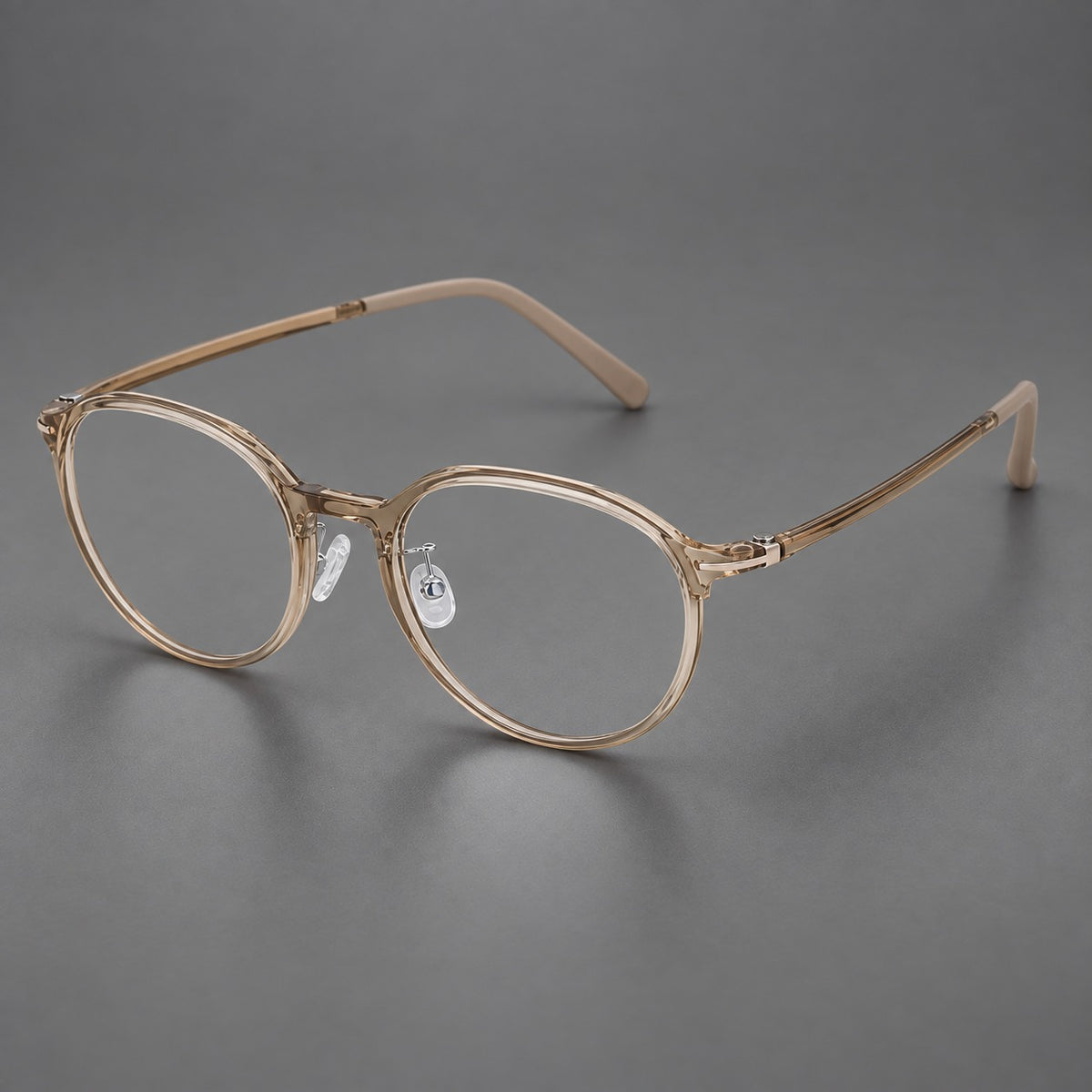 Retro round plastic eyeglasses with a curved bridge and slim metal corner accents — Tea — Main view [CINILY-JD2026-2201-C7]