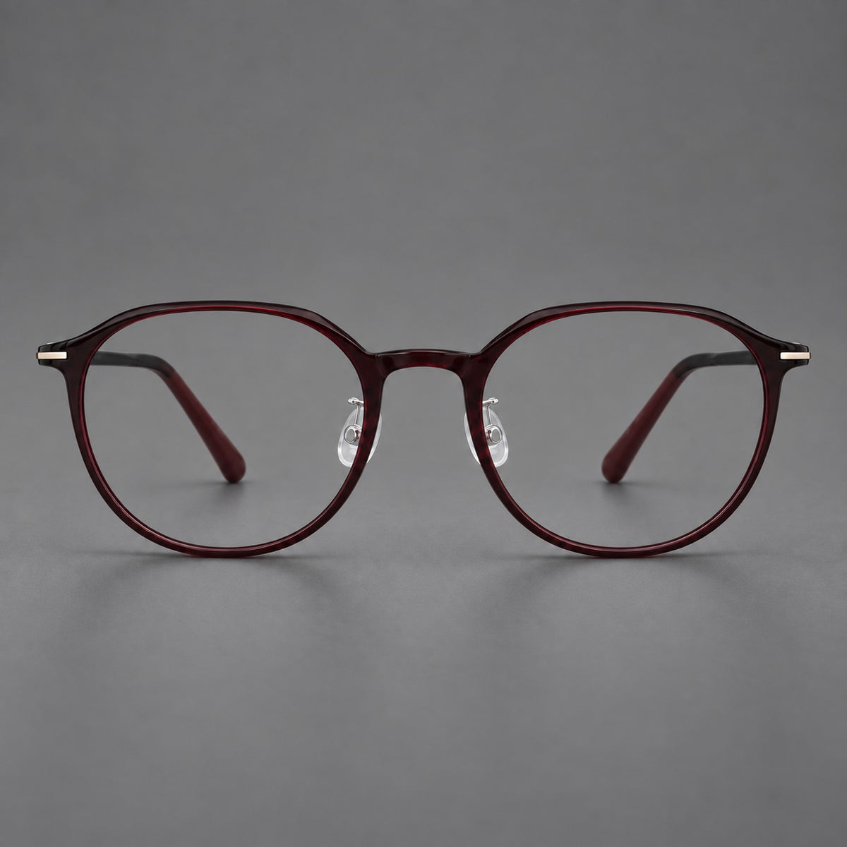 Retro round plastic eyeglasses with a curved bridge and slim metal corner accents — Deep Wine Red — Front view [CINILY-JD2026-2201-C9]