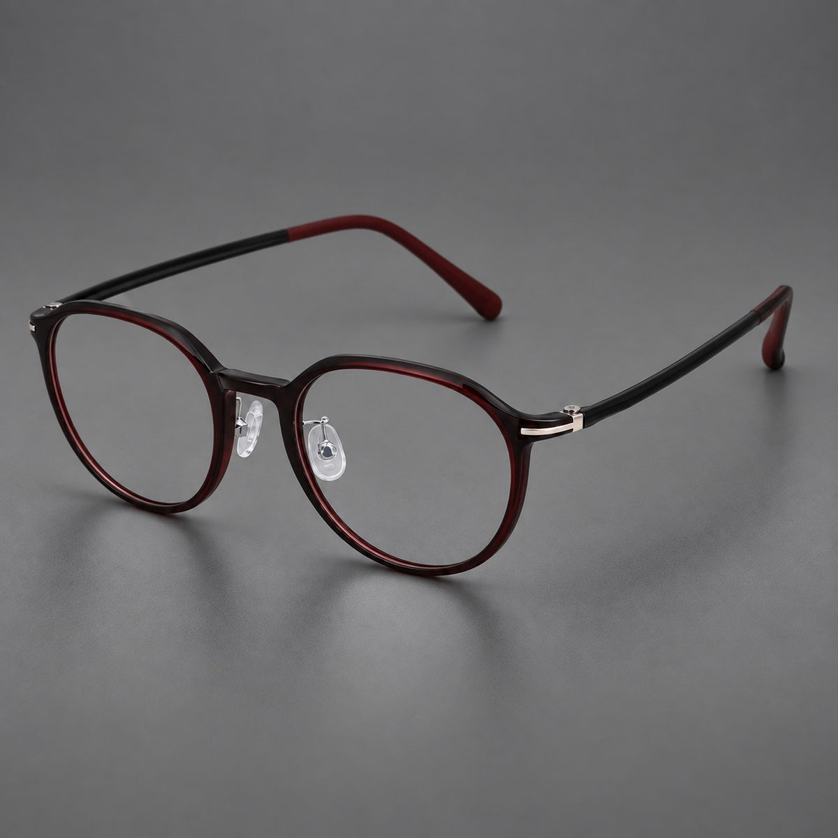Retro round plastic eyeglasses with a curved bridge and slim metal corner accents — Deep Wine Red — Main view [CINILY-JD2026-2201-C9]