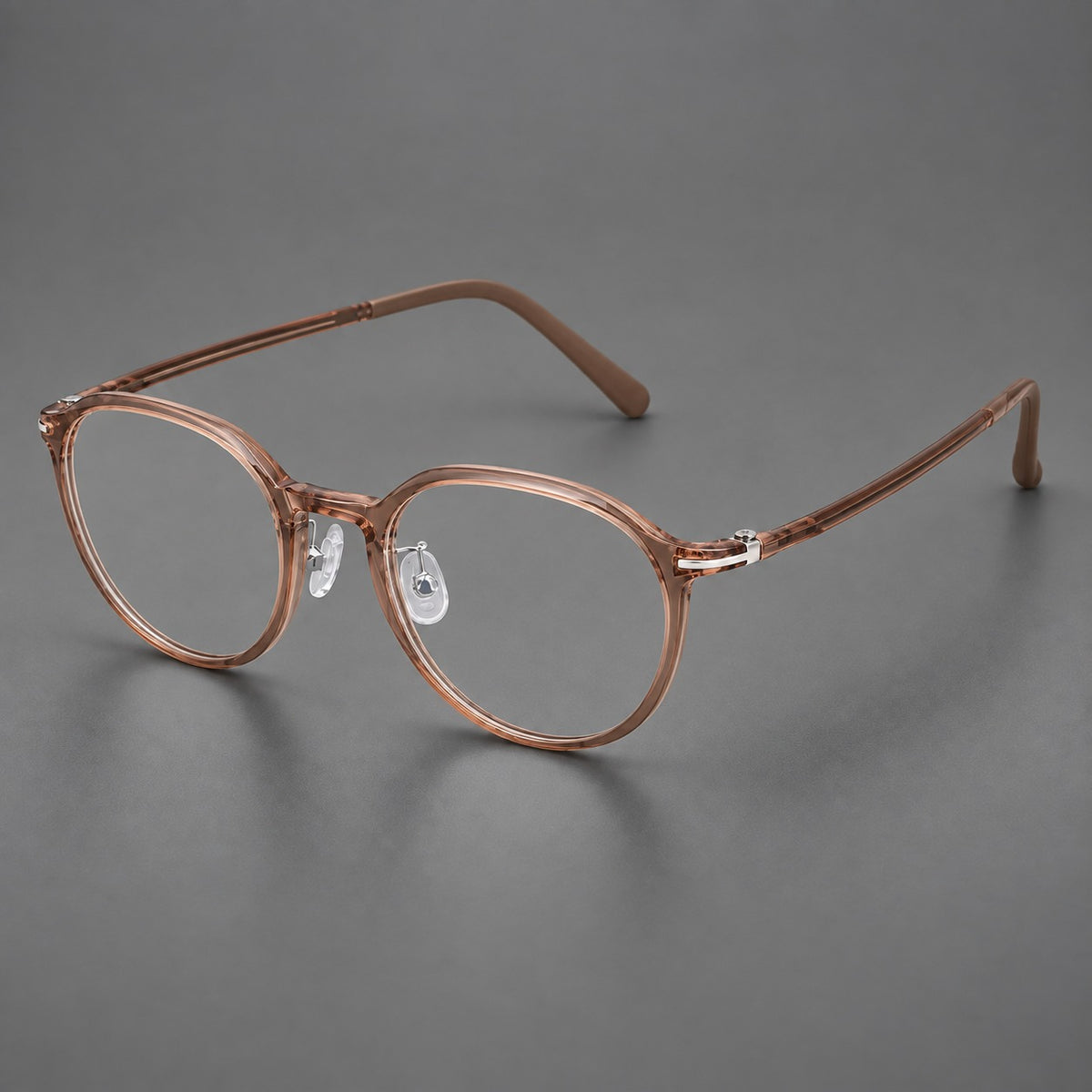 Compact round plastic eyeglasses with gently lifted corners and clear nose pads — Amber Tea — Main view [CINILY-JD2026-2202-C12]