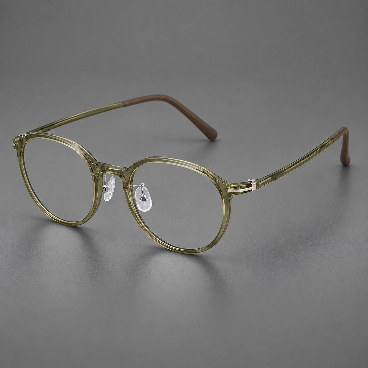Compact round plastic eyeglasses with gently lifted corners and clear nose pads — Iced Green Tea — Main view [CINILY-JD2026-2202-C19]