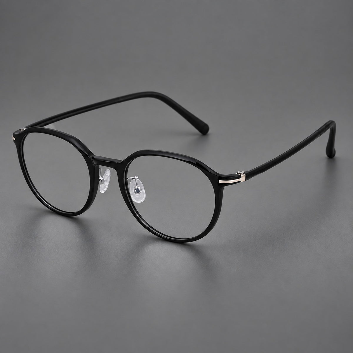 Compact round plastic eyeglasses with gently lifted corners and clear nose pads — Glossy Black — Main view [CINILY-JD2026-2202-C6]
