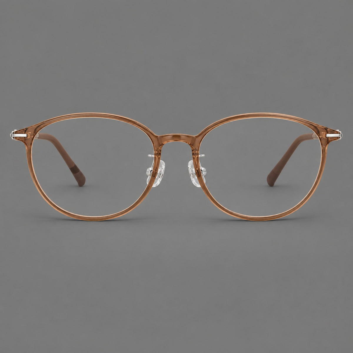 Slim oval plastic eyeglasses with a low profile and subtle metal corner accents — Honey Tea — Front view [CINILY-JD2026-2204-C14]