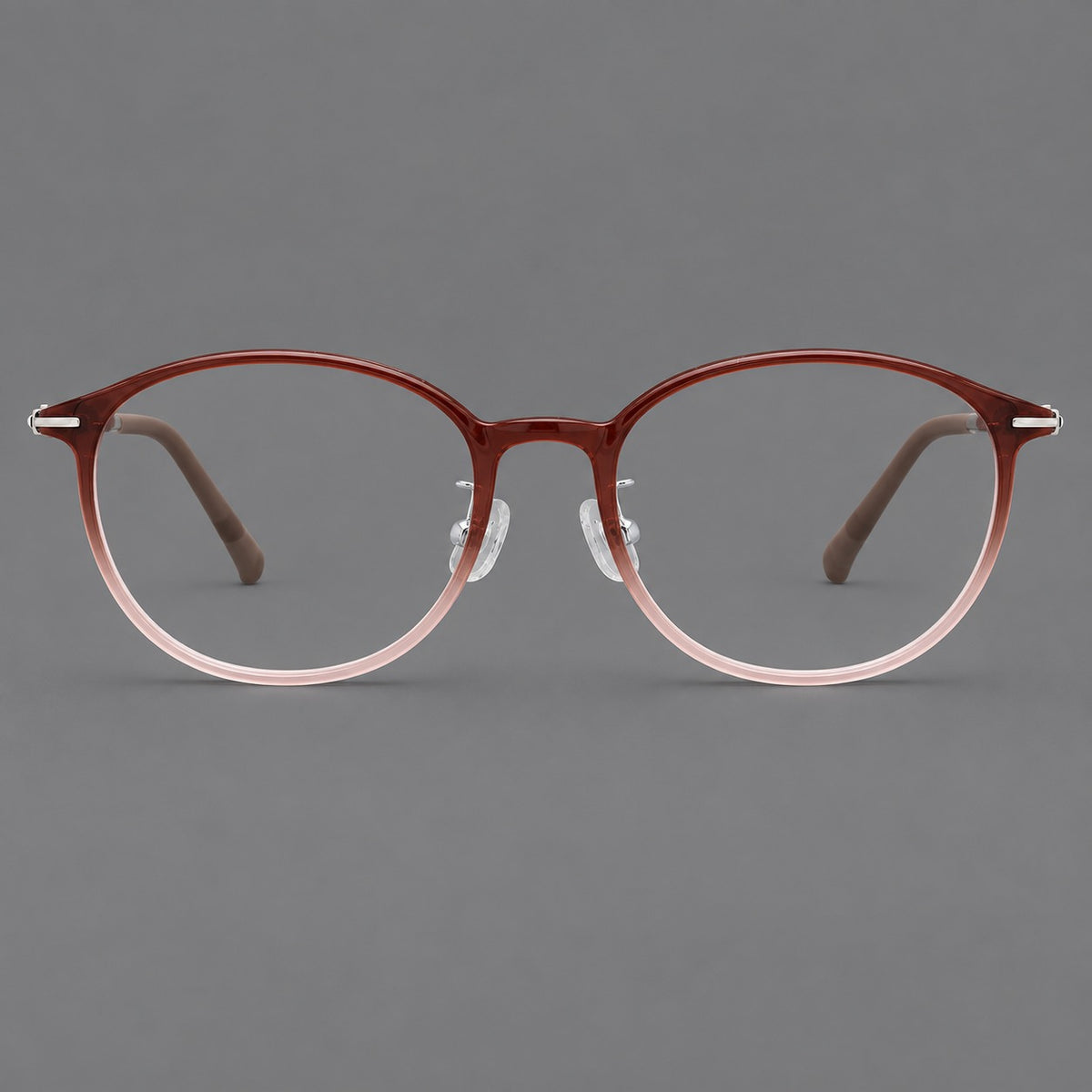 Slim oval plastic eyeglasses with a low profile and subtle metal corner accents — Red Brown Gradient — Front view [CINILY-JD2026-2204-C7]
