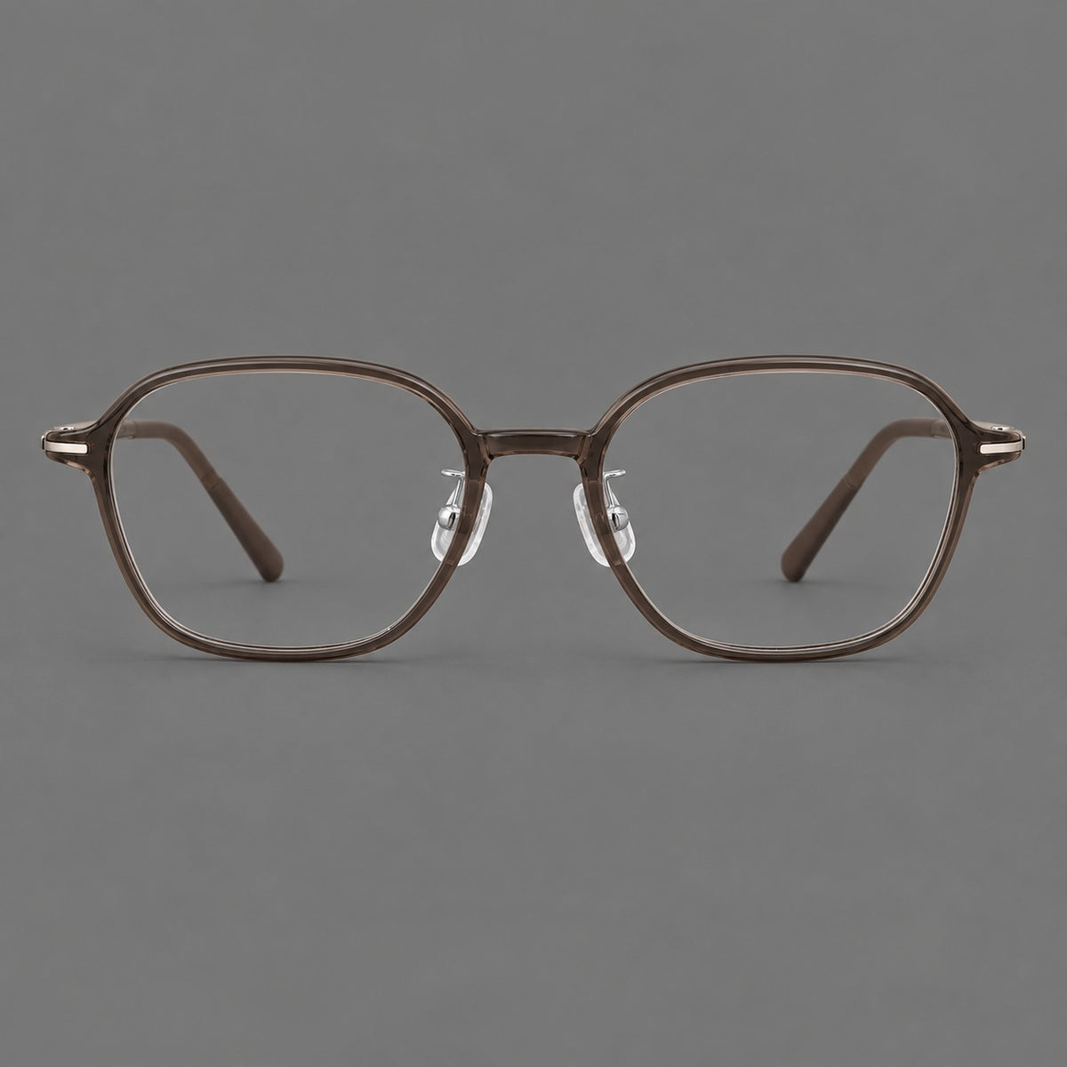 Rounded geometric plastic eyeglasses with softly angled rims and a curved bridge — Ink Brown — Front view [CINILY-JD2026-2207-C3]