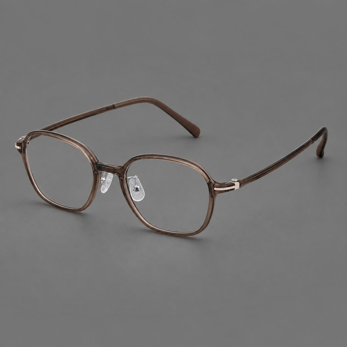 Rounded geometric plastic eyeglasses with softly angled rims and a curved bridge — Ink Brown — Main view [CINILY-JD2026-2207-C3]