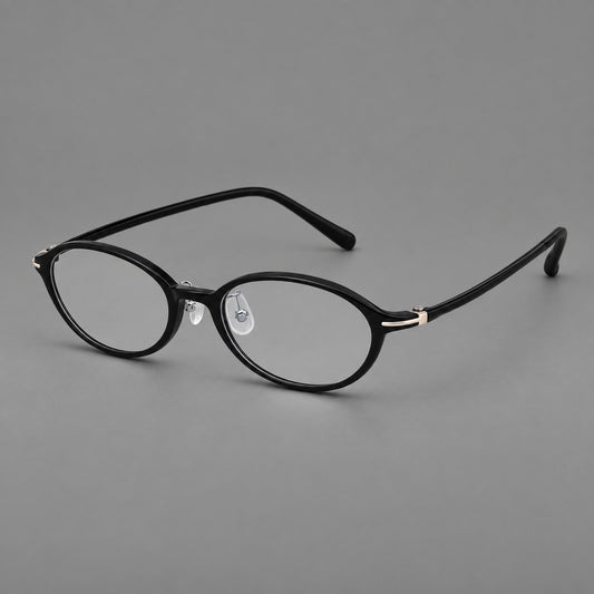 Vintage oval plastic eyeglasses with a softly curved browline and slim corner accents — Glossy Black — Main view [CINILY-JD2026-2210-C6]