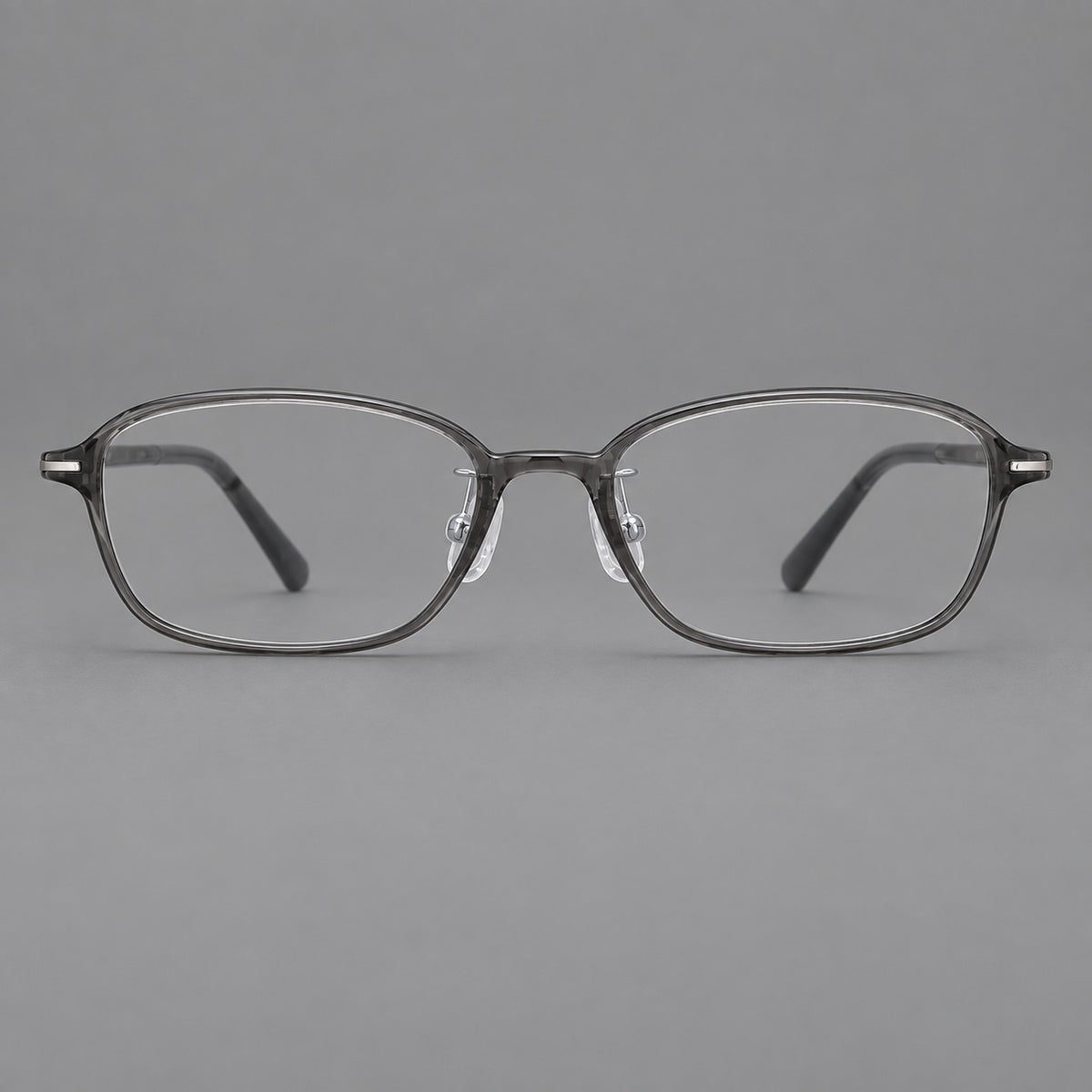 Soft oval plastic eyeglasses with a narrow bridge and gently rounded outer corners — Medium Grey — Front view [CINILY-JD2026-2211-C1]