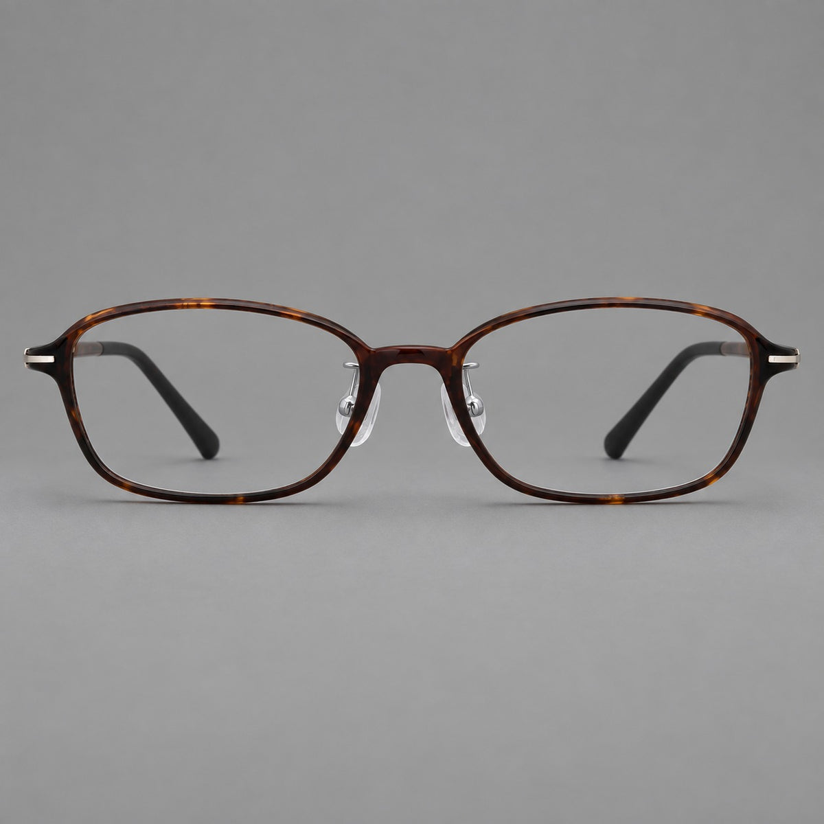 Soft oval plastic eyeglasses with a narrow bridge and gently rounded outer corners — Tortoiseshell — Front view [CINILY-JD2026-2211-C20]