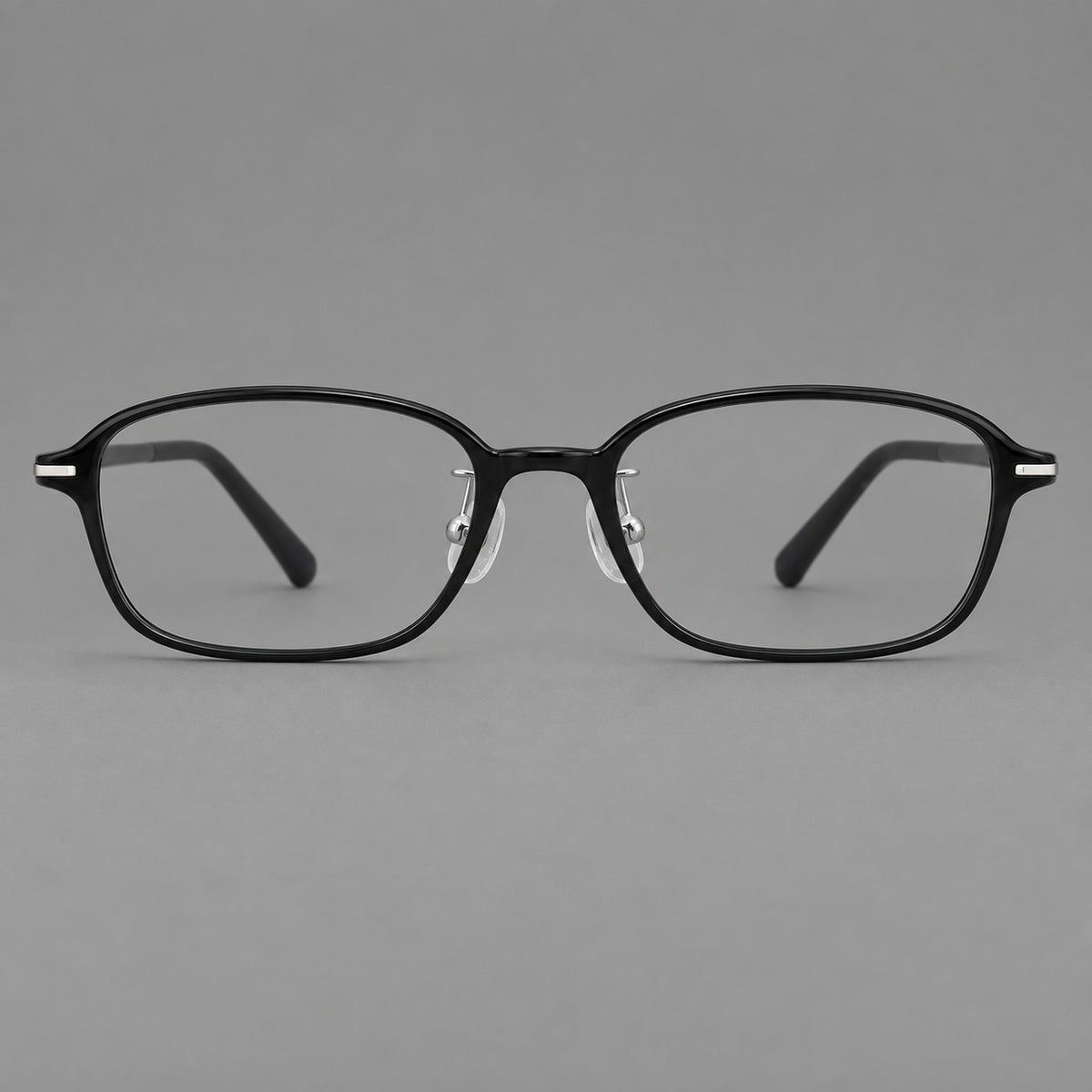 Soft oval plastic eyeglasses with a narrow bridge and gently rounded outer corners — Glossy Black — Front view [CINILY-JD2026-2211-C6]