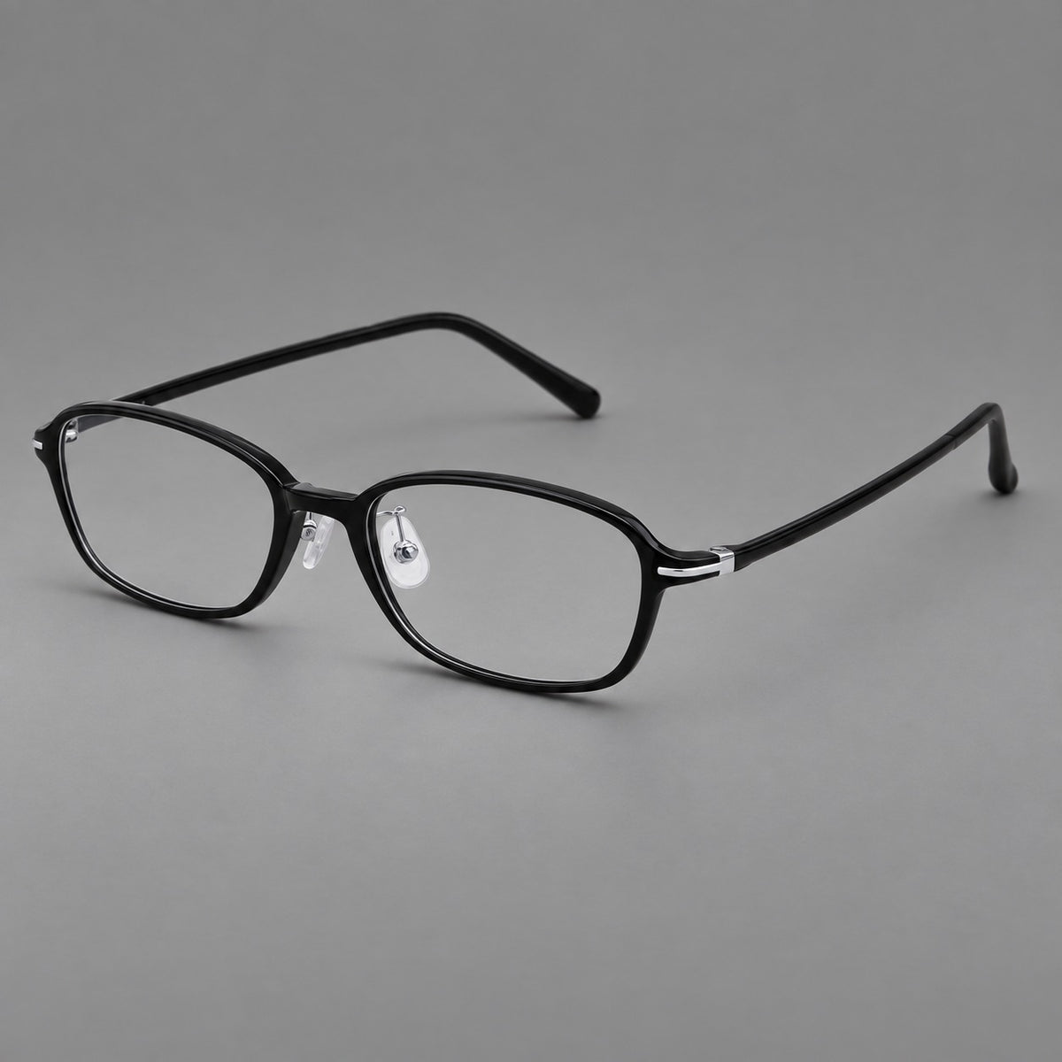 Soft oval plastic eyeglasses with a narrow bridge and gently rounded outer corners — Glossy Black — Main view [CINILY-JD2026-2211-C6]