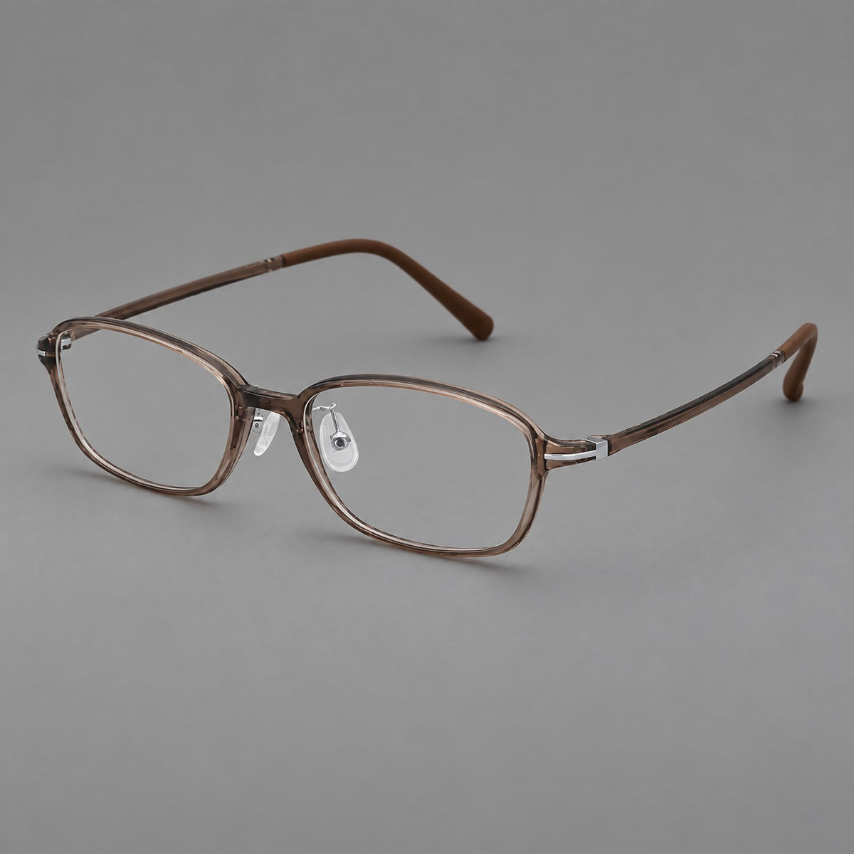 Soft oval plastic eyeglasses with a narrow bridge and gently rounded outer corners — Ink Brown — Main view [CINILY-JD2026-2211-C7]
