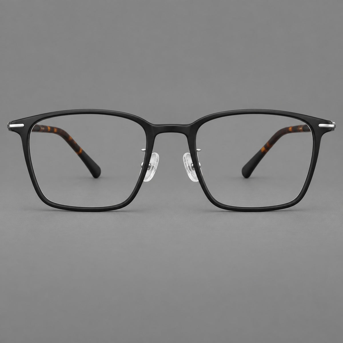 Modern square plastic eyeglasses with a smooth browline and slim metal corner details — Matte Black — Front view [CINILY-JD2026-2212-C6A]