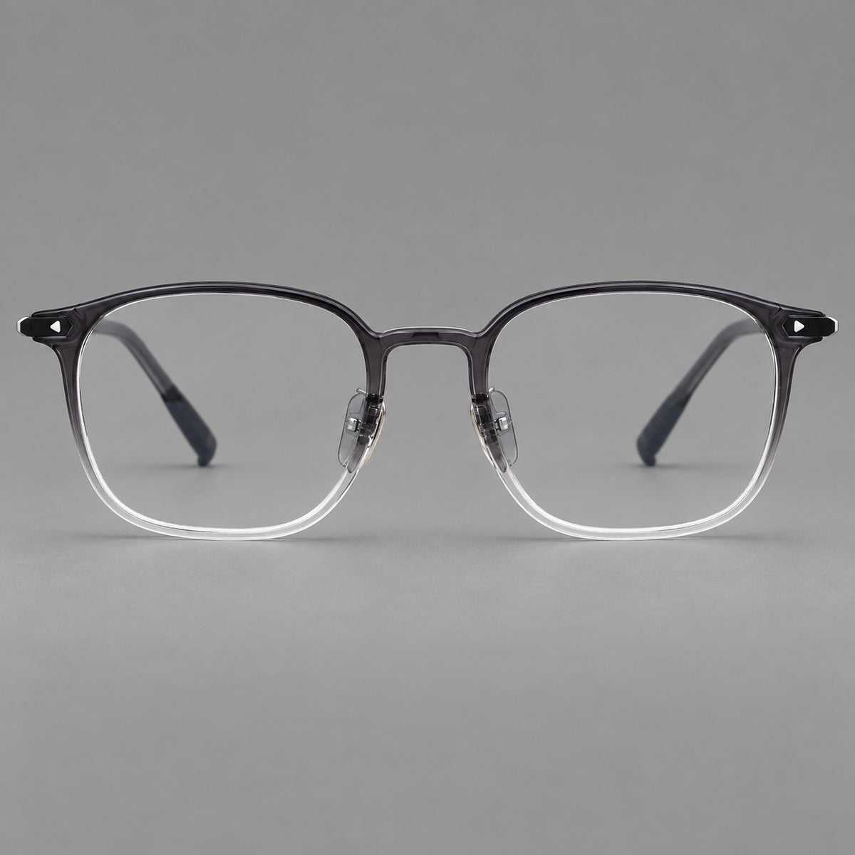 Retro square plastic eyeglasses with a curved bridge and triangular corner details — Ink Grey Gradient — Front view [CINILY-JD2026-2213-C2]