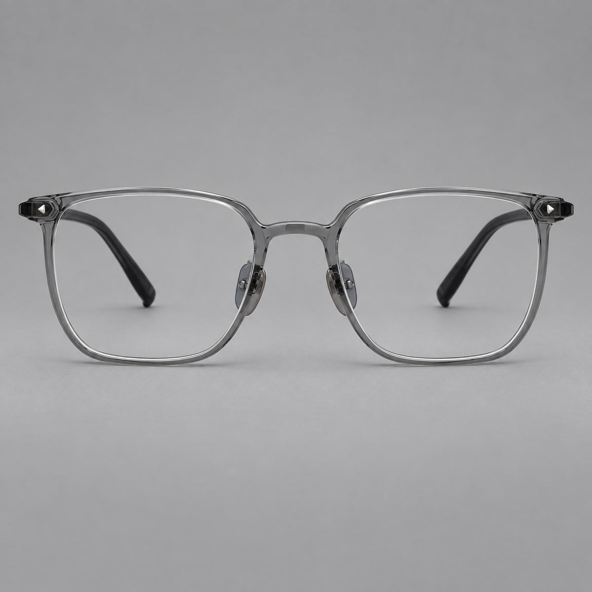 Refined rectangular plastic eyeglasses with raised outer corners and clear nose pads — Medium Grey — Front view [CINILY-JD2026-2215-C1]