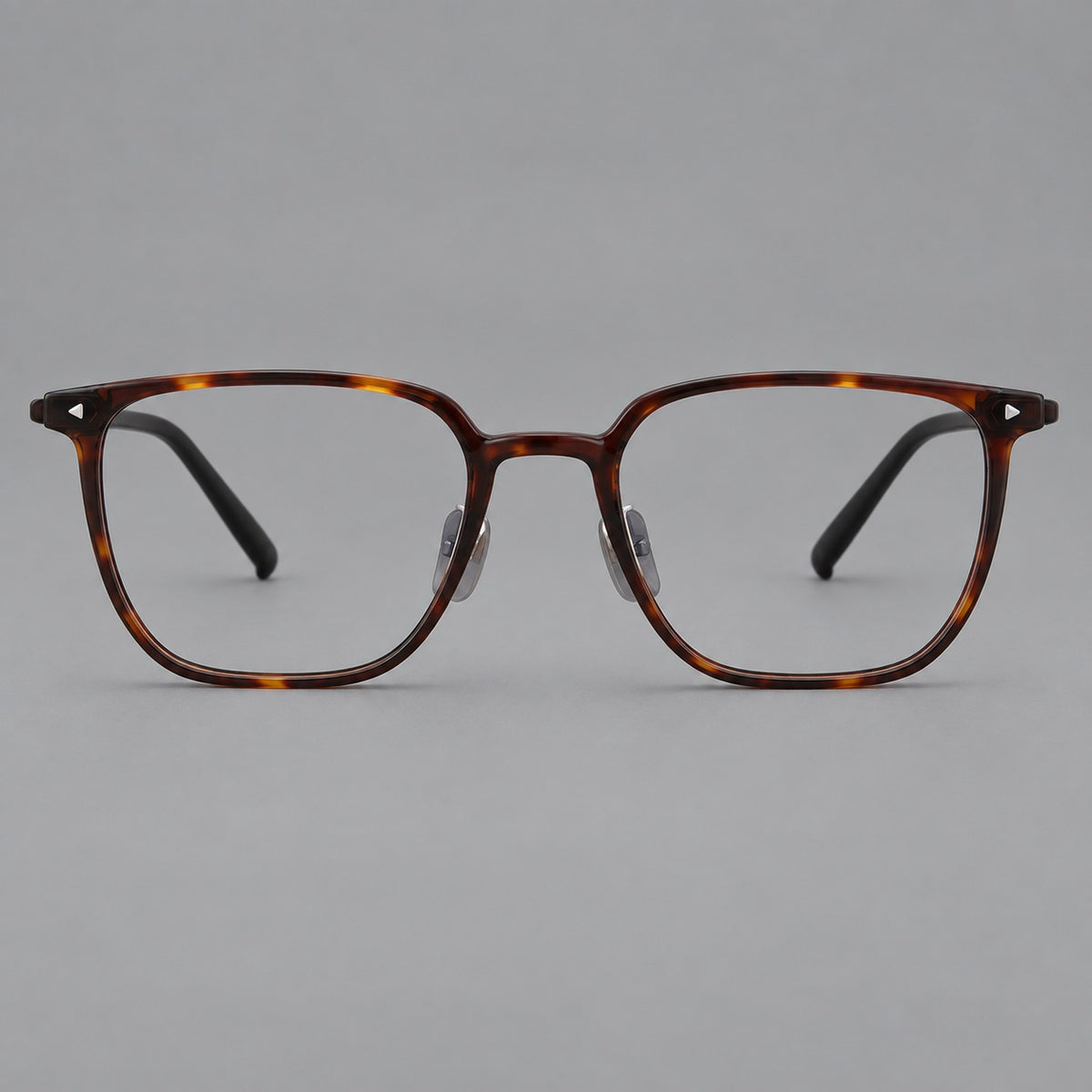 Refined rectangular plastic eyeglasses with raised outer corners and clear nose pads — Tortoiseshell — Front view [CINILY-JD2026-2215-C20]