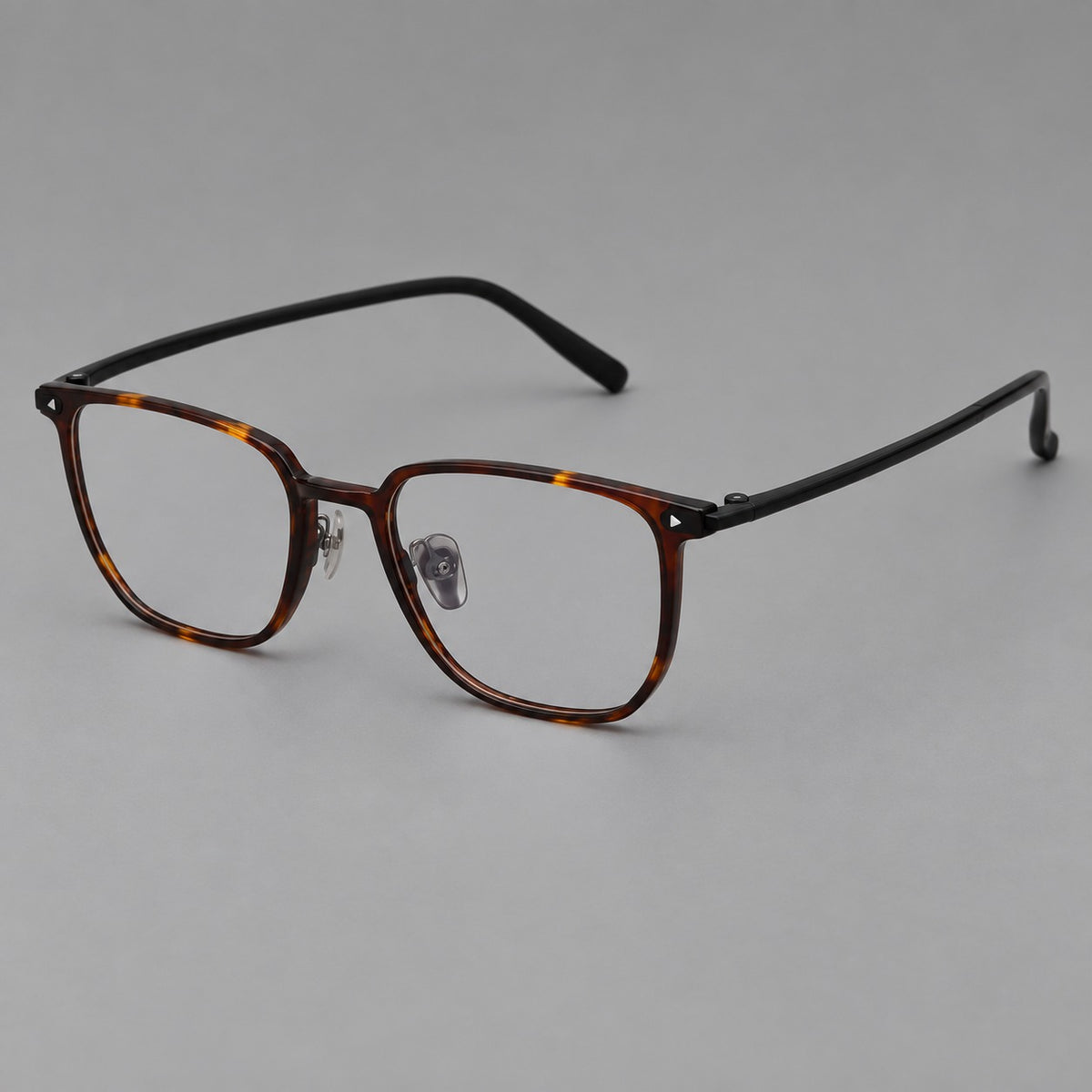 Refined rectangular plastic eyeglasses with raised outer corners and clear nose pads — Tortoiseshell — Main view [CINILY-JD2026-2215-C20]