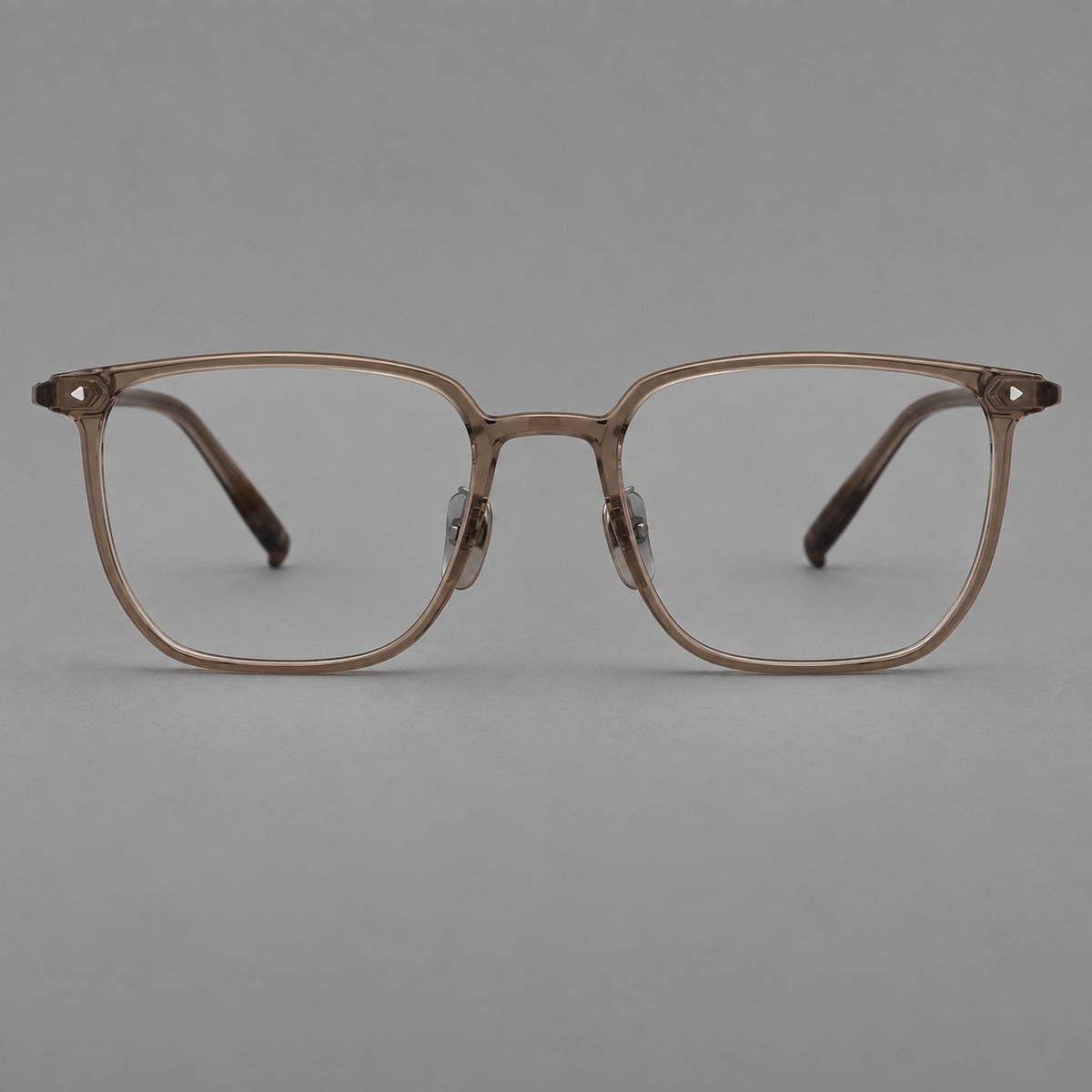 Refined rectangular plastic eyeglasses with raised outer corners and clear nose pads — Brown — Front view [CINILY-JD2026-2215-C7]