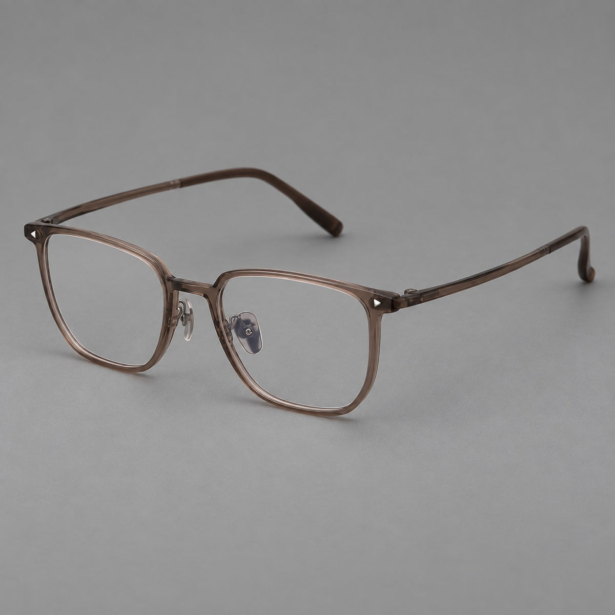 Refined rectangular plastic eyeglasses with raised outer corners and clear nose pads — Brown — Main view [CINILY-JD2026-2215-C7]