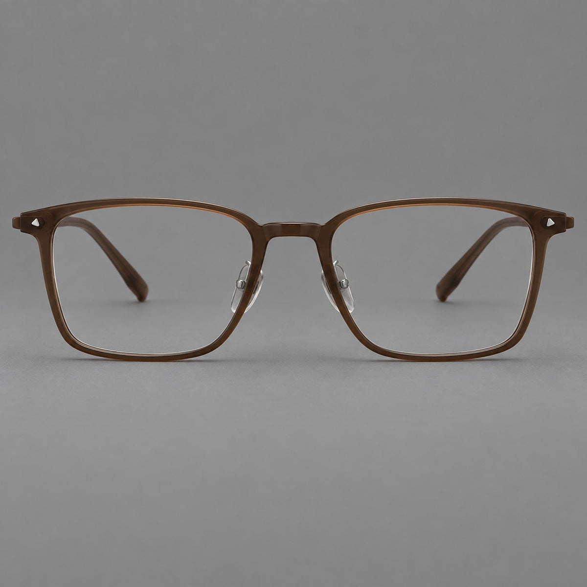 Clean rectangular plastic eyeglasses with flat lower rims and pointed corner details — Tea Brown — Front view [CINILY-JD2026-2217-C7]