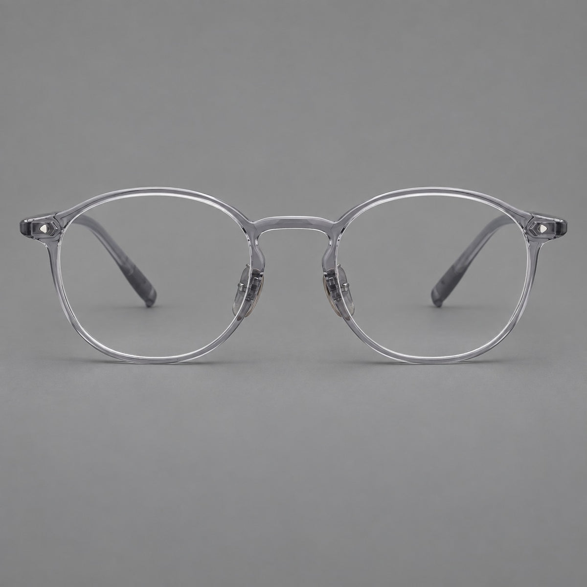 Vintage round plastic eyeglasses with a curved bridge and subtle triangular accents — Light Grey — Front view [CINILY-JD2026-2218-C1]
