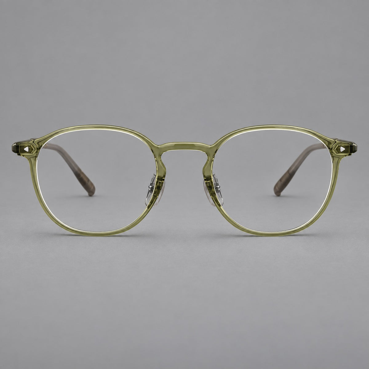 Vintage round plastic eyeglasses with a curved bridge and subtle triangular accents — Light Green — Front view [CINILY-JD2026-2218-C19]