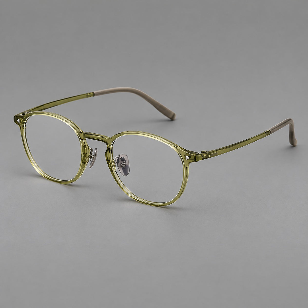 Vintage round plastic eyeglasses with a curved bridge and subtle triangular accents — Light Green — Main view [CINILY-JD2026-2218-C19]