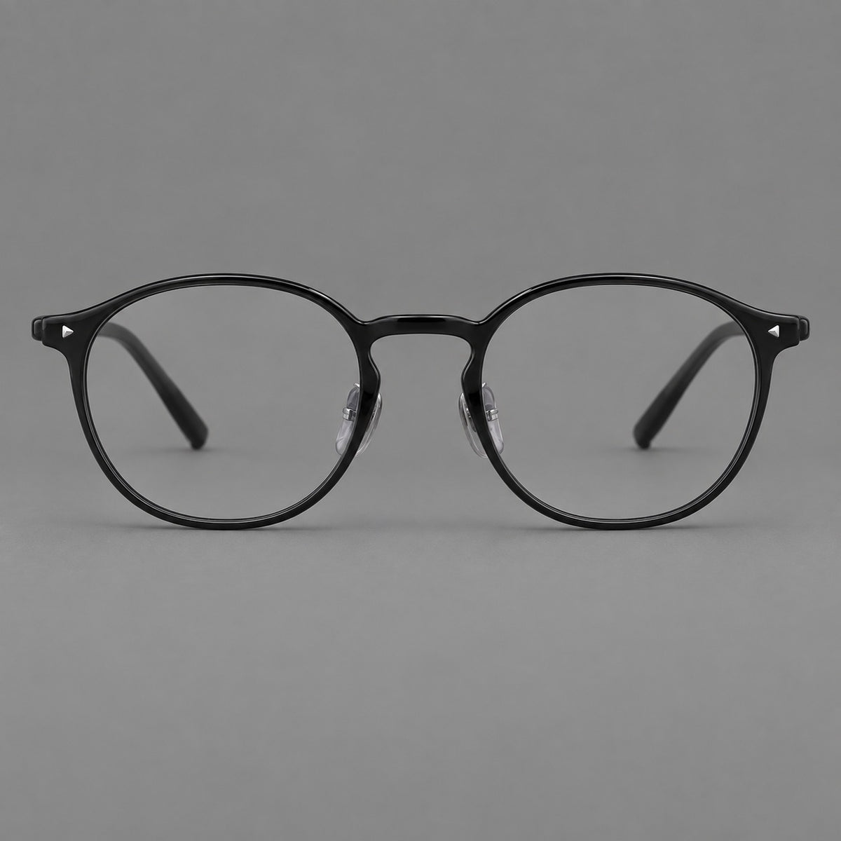 Vintage round plastic eyeglasses with a curved bridge and subtle triangular accents — Glossy Black — Front view [CINILY-JD2026-2218-C6]