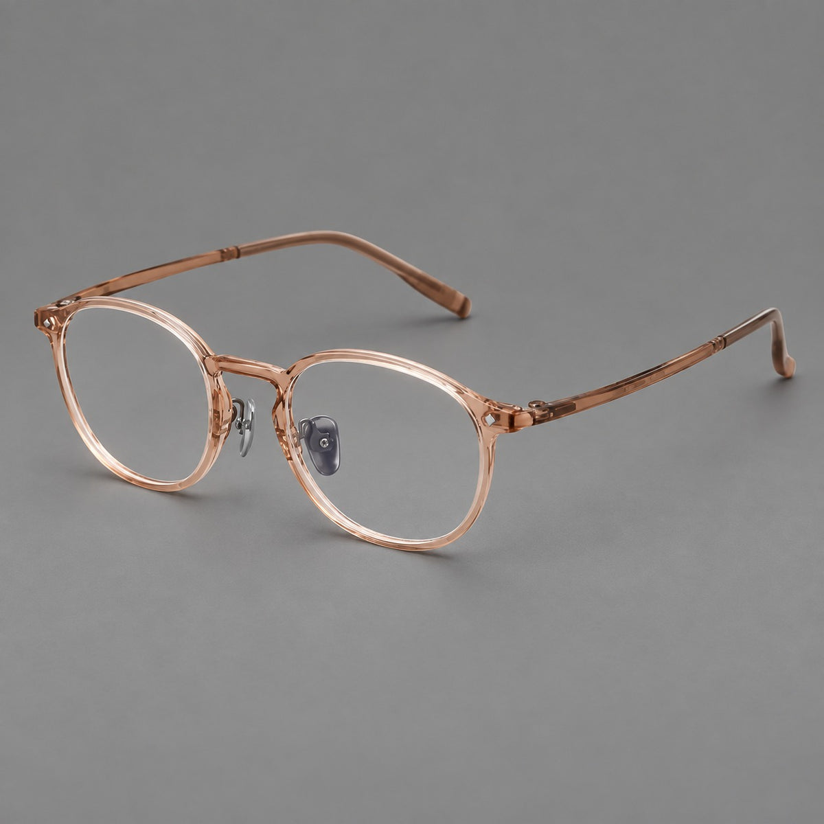 Vintage round plastic eyeglasses with a curved bridge and subtle triangular accents — Tea — Main view [CINILY-JD2026-2218-C7]