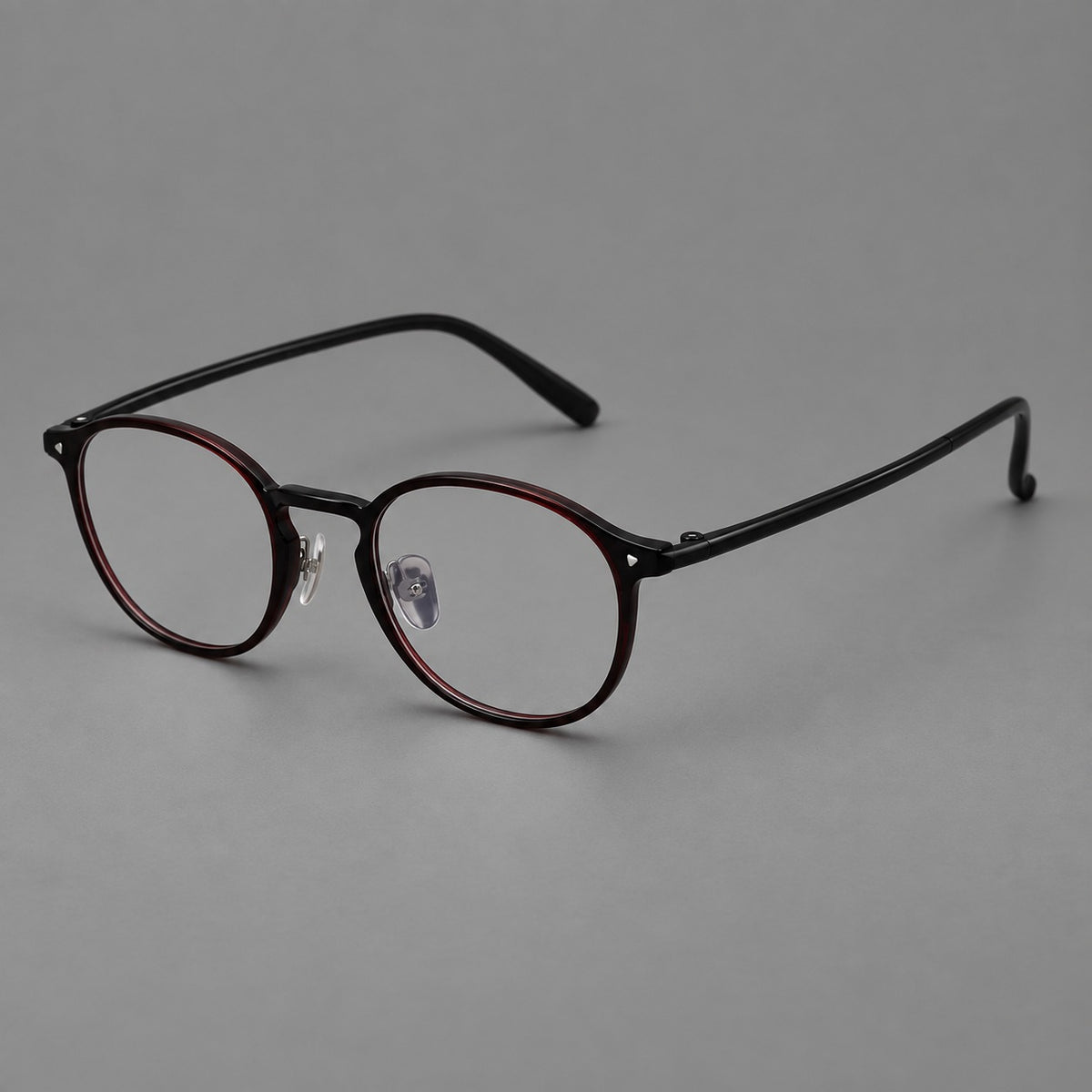 Vintage round plastic eyeglasses with a curved bridge and subtle triangular accents — Deep Wine Red — Main view [CINILY-JD2026-2218-C9]
