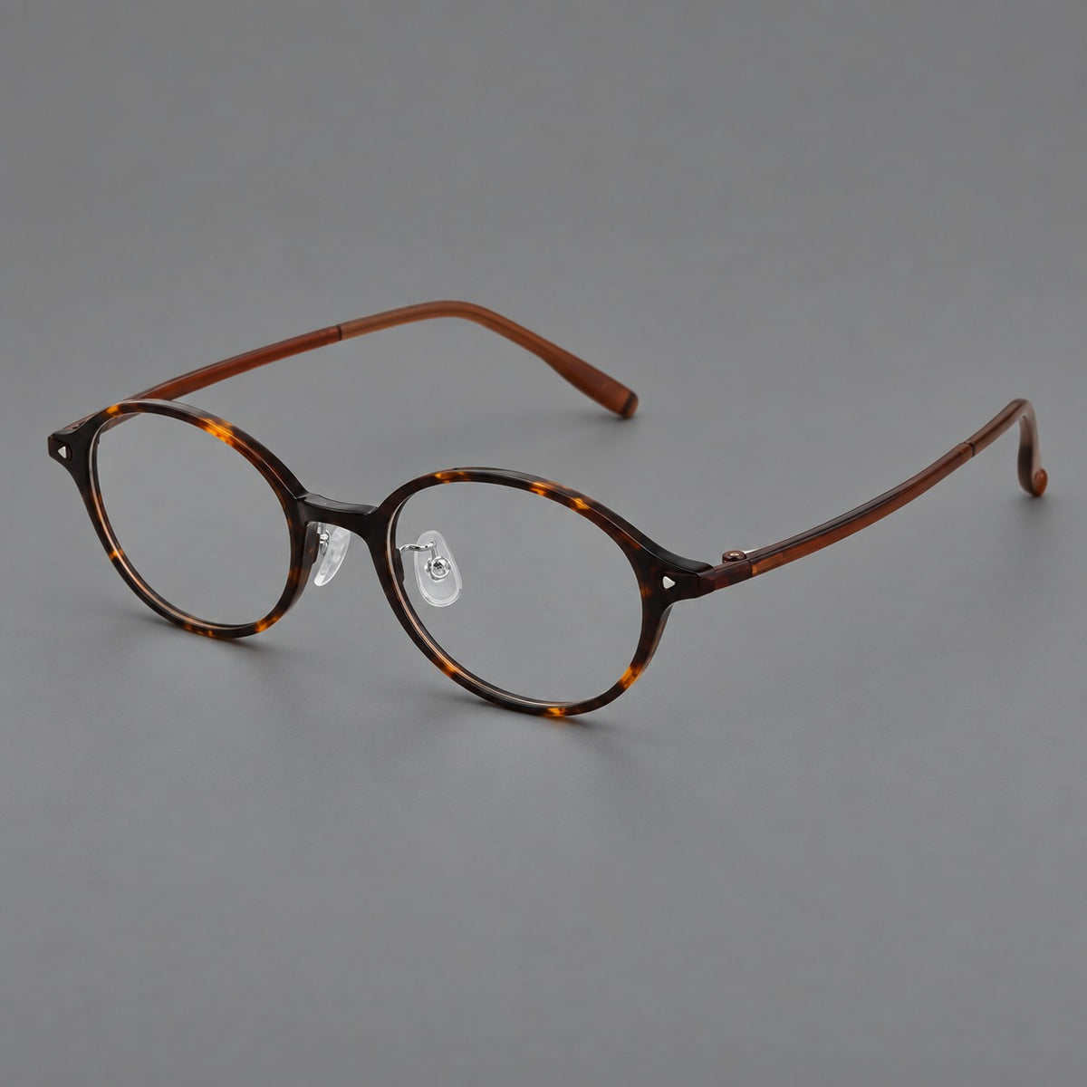 Retro round plastic eyeglasses with softly lifted corners and a sculpted bridge — Tortoiseshell — Main view [CINILY-JD2026-2221-C20]