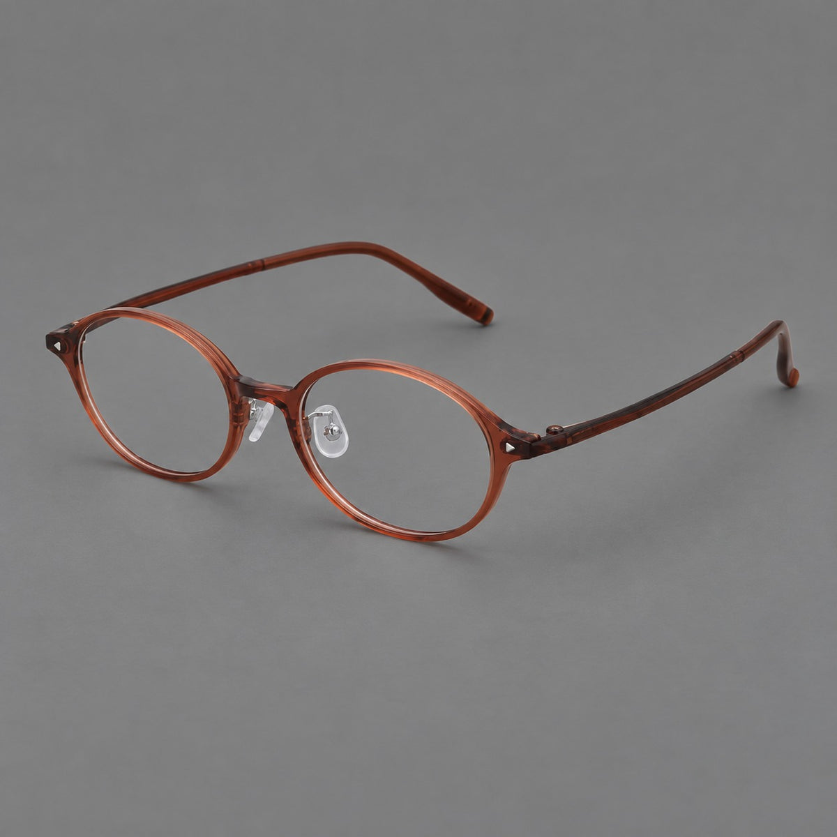 Retro round plastic eyeglasses with softly lifted corners and a sculpted bridge — Brown Red — Main view [CINILY-JD2026-2221-C9]