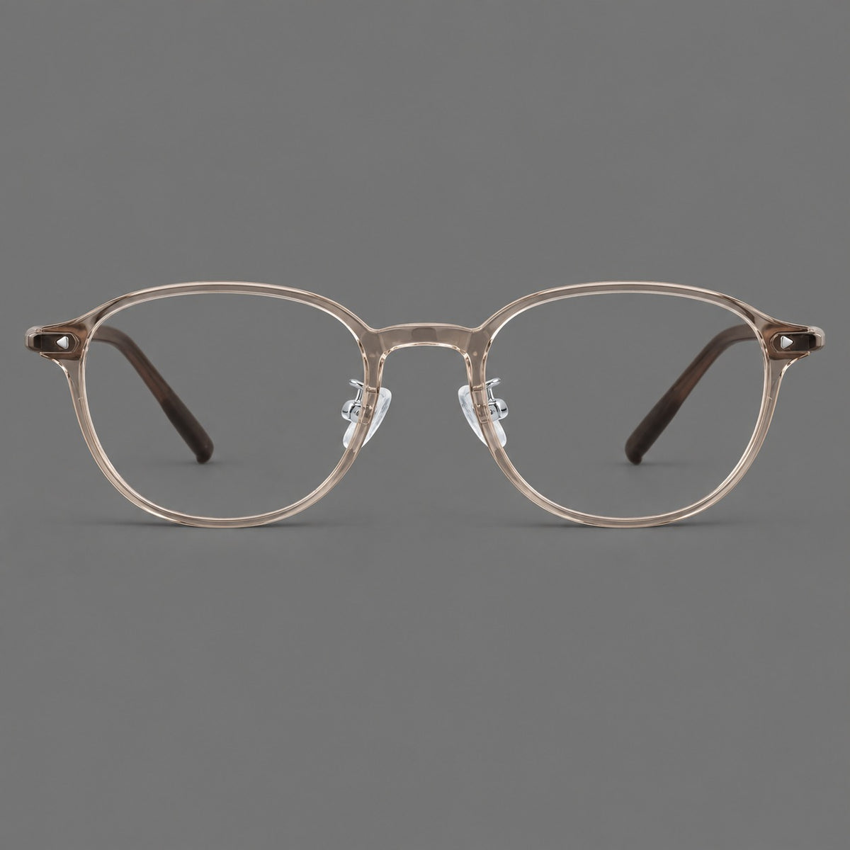 Panto plastic eyeglasses with a rounded silhouette and triangular corner studs — Tea — Front view [CINILY-JD2026-2222-C14]