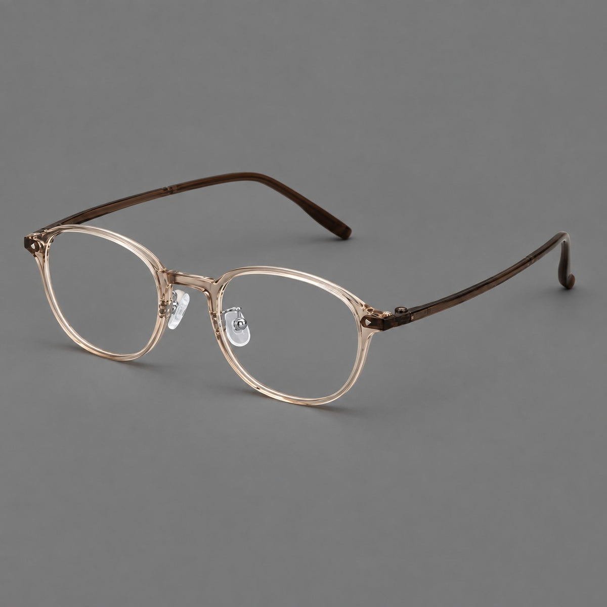 Panto plastic eyeglasses with a rounded silhouette and triangular corner studs — Tea — Main view [CINILY-JD2026-2222-C14]