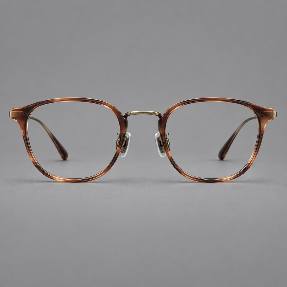 Retro soft square eyeglasses in acetate and titanium with a curved bridge and slender temples — Amber Tortoiseshell / Antique Gold — Front view [CINILY-JD2026-61001-C1]