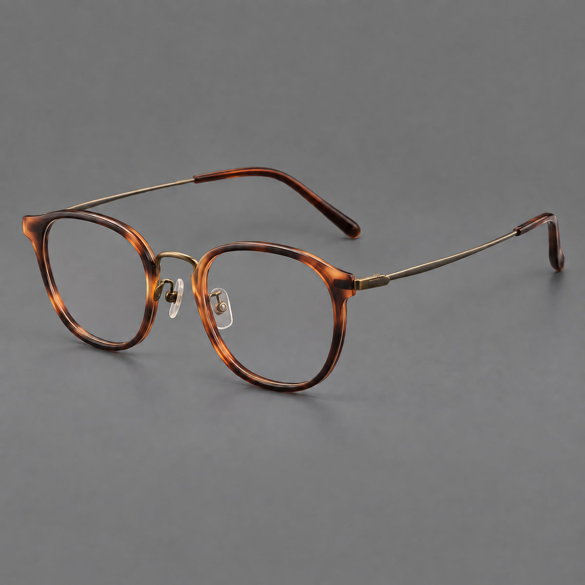 Retro soft square eyeglasses in acetate and titanium with a curved bridge and slender temples — Amber Tortoiseshell / Antique Gold — Main view [CINILY-JD2026-61001-C1]