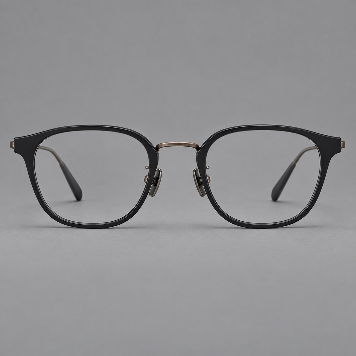 Retro soft square eyeglasses in acetate and titanium with a curved bridge and slender temples — Matte Black / Antique Copper — Front view [CINILY-JD2026-61001-C6]