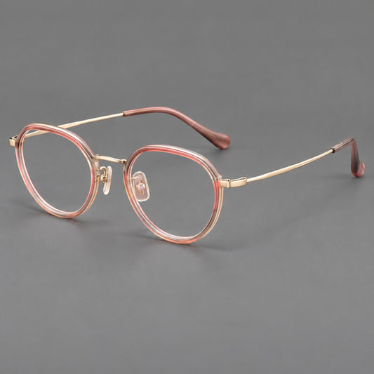 Rounded eyeglasses in acetate and titanium with gently arched brows and engraved metal temples — Amber Pink / Gold — Main view [CINILY-JD2026-61002-C1]