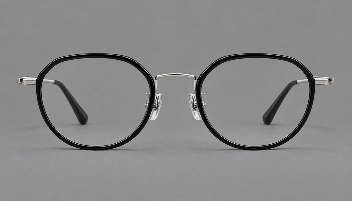 Rounded eyeglasses in acetate and titanium with gently arched brows and engraved metal temples — Black / Silver — Front view [CINILY-JD2026-61002-C5]