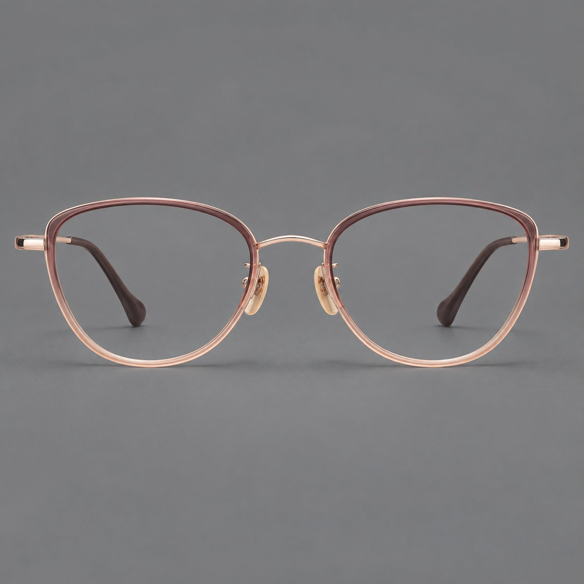Upswept eyeglasses in acetate and titanium with softly rounded rims and tapered metal temples — Pink Tea Gradient / Rose Gold — Front view [CINILY-JD2026-61003-C2]