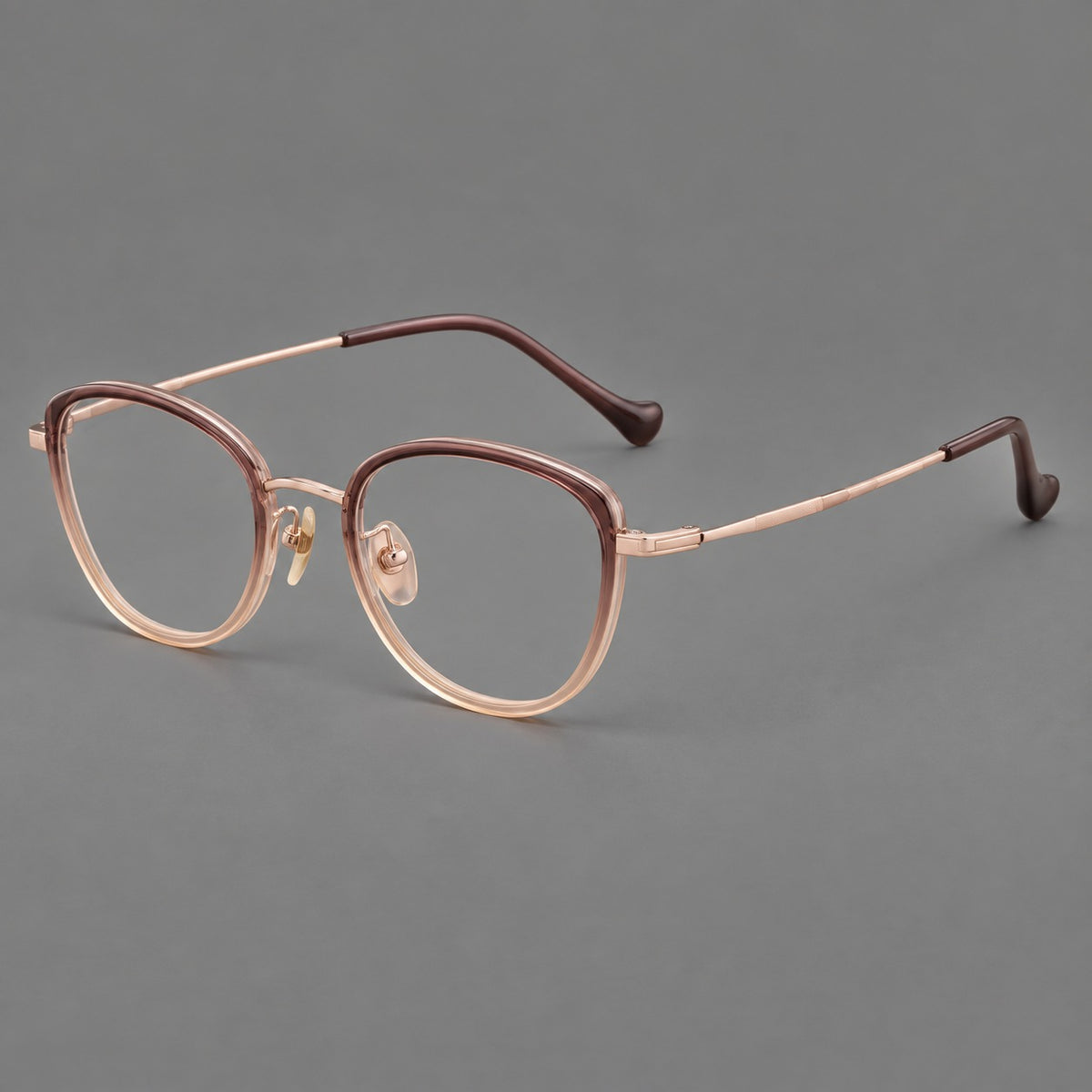 Upswept eyeglasses in acetate and titanium with softly rounded rims and tapered metal temples — Pink Tea Gradient / Rose Gold — Main view [CINILY-JD2026-61003-C2]