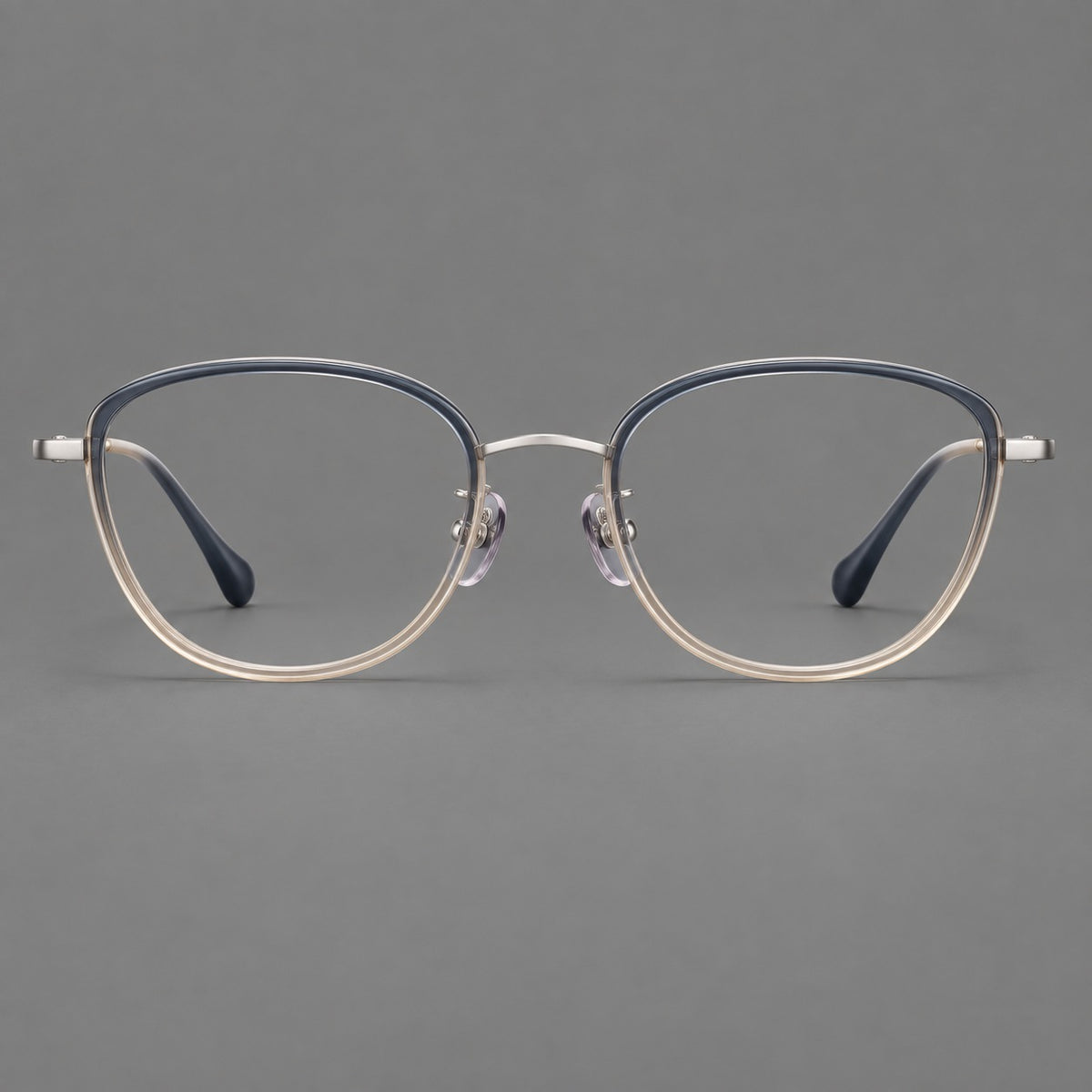 Upswept eyeglasses in acetate and titanium with softly rounded rims and tapered metal temples — Blue Tea Gradient / Gunmetal — Front view [CINILY-JD2026-61003-C3]