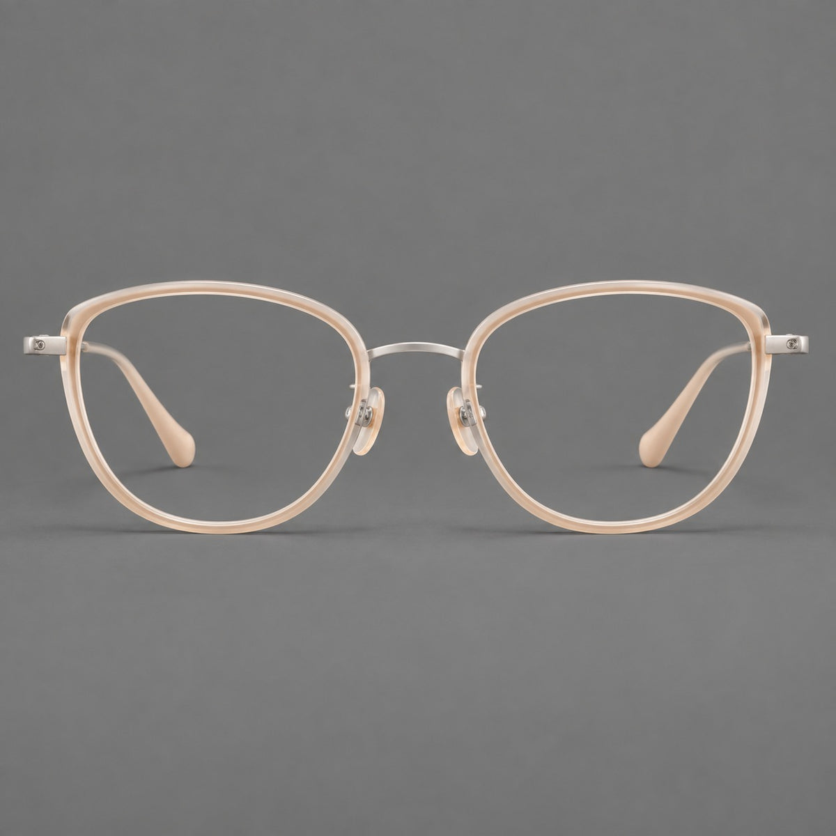 Upswept eyeglasses in acetate and titanium with softly rounded rims and tapered metal temples — Nude Pink / Silver — Front view [CINILY-JD2026-61003-C6]