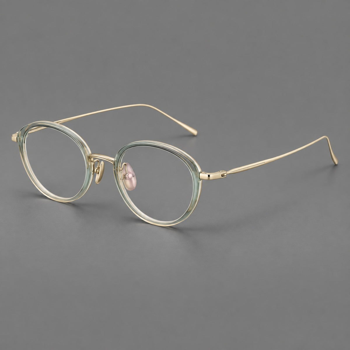 Round eyeglasses in acetate and titanium with a slim curved bridge and fine metal temples — Green / Gold — Main view [CINILY-JD2026-61004-C1]