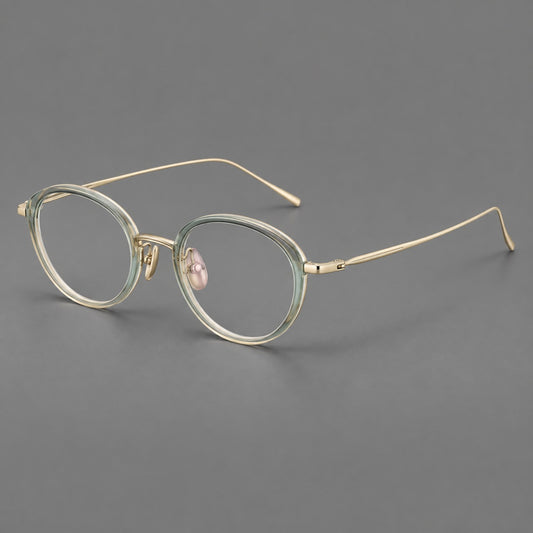 Round eyeglasses in acetate and titanium with a slim curved bridge and fine metal temples — Green / Gold — Main view [CINILY-JD2026-61004-C1]