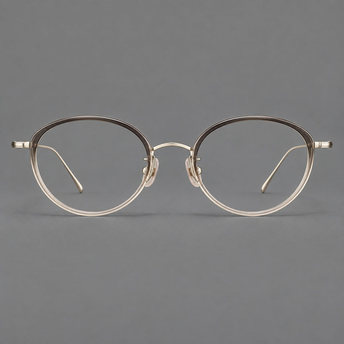 Round eyeglasses in acetate and titanium with a slim curved bridge and fine metal temples — Grey Tea Gradient / Gold — Front view [CINILY-JD2026-61004-C3]