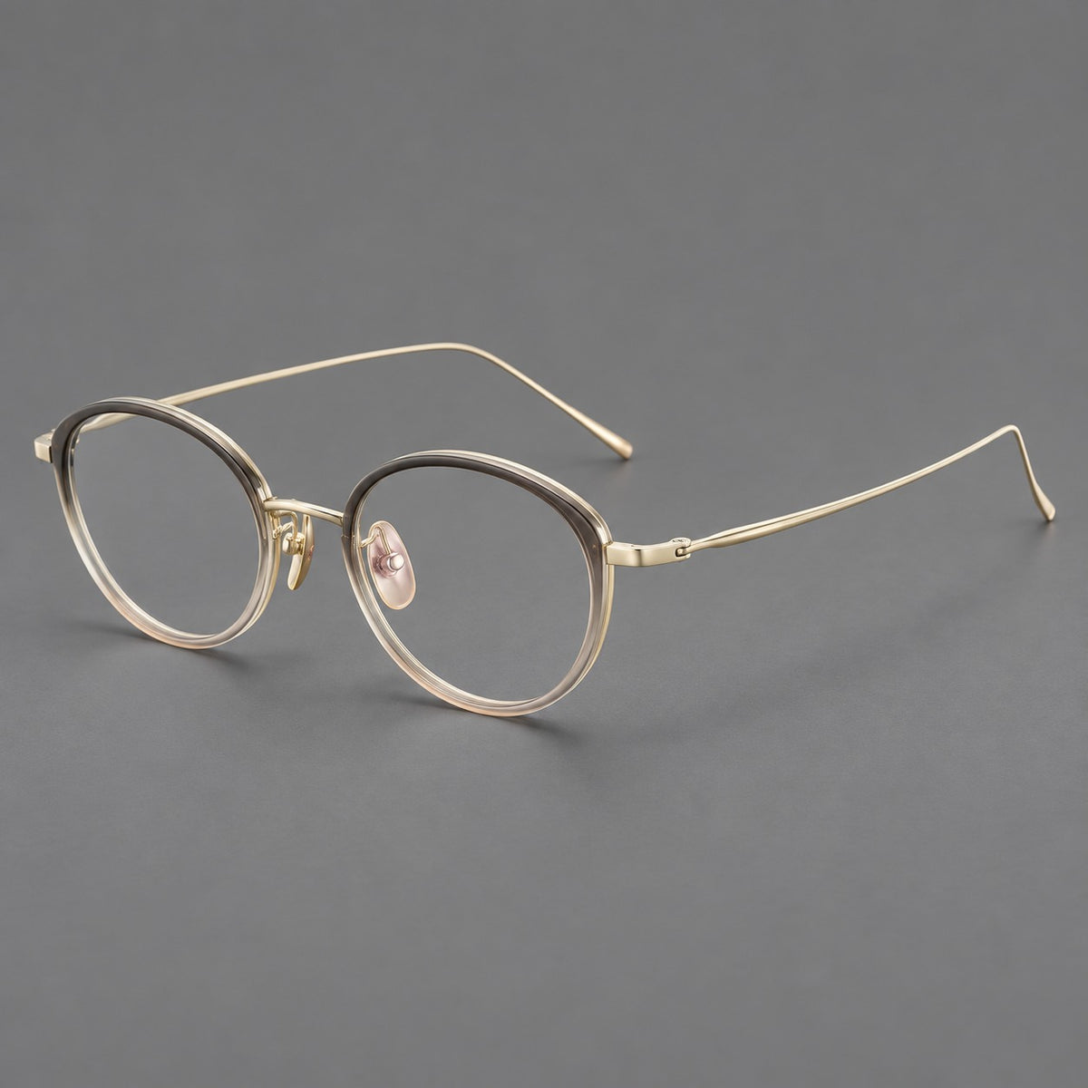 Round eyeglasses in acetate and titanium with a slim curved bridge and fine metal temples — Grey Tea Gradient / Gold — Main view [CINILY-JD2026-61004-C3]