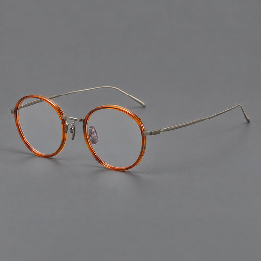 Classic round eyeglasses in acetate and titanium with slim rims and textured metal temples — Tea Brown / Gunmetal — Main view [CINILY-JD2026-61005-C1]